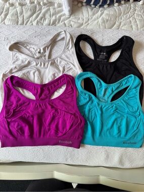 Reebok Sports Bra Pack in White, Black, Fuchsia, Teal